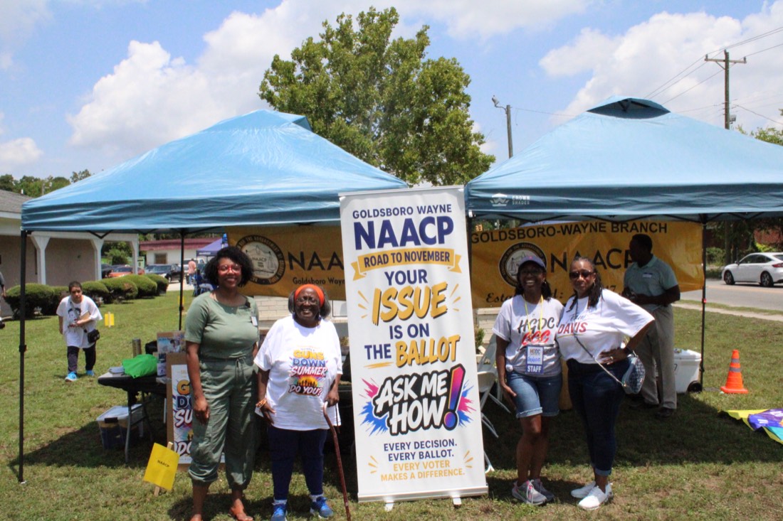 Goldsboro-Wayne NAACP voter outreach booth at Community Day