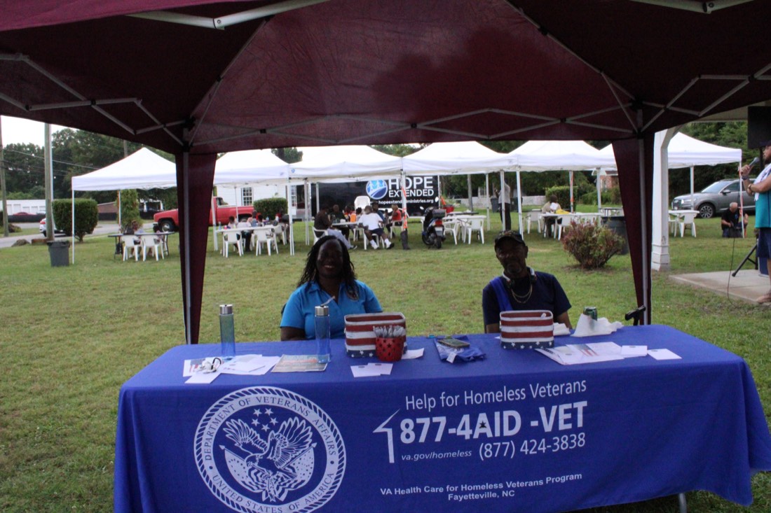 Volunteers at the VA homeless veterans outreach table